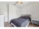 Cozy bedroom with a comfortable bed, ceiling fan, and ample natural light at 3350 Mermoor Dr # 1201, Palm Harbor, FL 34685
