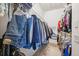 Walk-in closet with ample storage space and custom shelving at 3350 Mermoor Dr # 1201, Palm Harbor, FL 34685