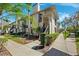 Charming townhouse with tropical landscaping, sunny skies and well manicured walkway and private front entrance at 3350 Mermoor Dr # 1201, Palm Harbor, FL 34685