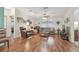 Spacious living room with laminate flooring, ceiling fan, and comfortable furniture at 37545 Lilly Bea Ave, Zephyrhills, FL 33541