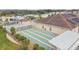 Community shuffleboard and recreational center featuring solar panels on the roof at 37545 Lilly Bea Ave, Zephyrhills, FL 33541