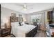 Comfortable bedroom with a large bed, stylish decor, and plenty of natural light for a peaceful retreat at 3829 Trophy Blvd, New Port Richey, FL 34655