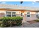 Charming home exterior featuring a well-maintained yard and inviting front entrance with white trim at 3829 Trophy Blvd, New Port Richey, FL 34655