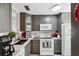 This well-equipped kitchen features modern appliances, ample cabinet space, and a convenient layout at 3829 Trophy Blvd, New Port Richey, FL 34655