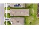 An aerial view of a single Gathering home featuring a well-maintained roof and surrounding greenery at 407 Sandsend Ct, Apollo Beach, FL 33572
