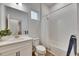 Bright bathroom featuring a vanity with a plant, tile flooring, and a shower with white subway tile at 407 Sandsend Ct, Apollo Beach, FL 33572