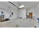 Spacious garage with ample room for parking and storage at 407 Sandsend Ct, Apollo Beach, FL 33572