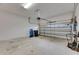 Clean, well-lit garage with an automatic door and ample space for vehicles and storage at 407 Sandsend Ct, Apollo Beach, FL 33572