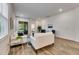 A living room with bright natural light and a neutral color palette at 407 Sandsend Ct, Apollo Beach, FL 33572