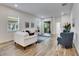 Light-filled living room features an open floor plan and neutral color palette at 407 Sandsend Ct, Apollo Beach, FL 33572