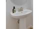 Close up view of a sink in the powder room featuring stylish fixtures at 407 Sandsend Ct, Apollo Beach, FL 33572