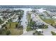 Aerial view of waterfront community with docks, multiple condos, and a canal view at 4650 Bay Blvd # 1012, Port Richey, FL 34668