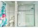 Bathroom featuring a shower/tub combination with sliding glass doors at 4650 Bay Blvd # 1012, Port Richey, FL 34668