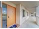 Condominium entrance with a welcome mat and an ocean view at 4650 Bay Blvd # 1012, Port Richey, FL 34668