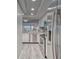 Modern kitchen with stainless steel appliances and a view of the living room and patio at 4650 Bay Blvd # 1012, Port Richey, FL 34668