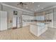 Well-appointed kitchen with a large island, stainless steel appliances, and abundant storage at 4650 Bay Blvd # 1012, Port Richey, FL 34668