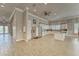Spacious kitchen featuring stainless steel appliances, an island, and ample cabinet space at 4650 Bay Blvd # 1012, Port Richey, FL 34668