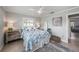 Coastal bedroom with a surfboard and sand dollar decor at 520 74Th St, Holmes Beach, FL 34217