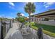 Beautiful dock and seating area with lush landscaping, ideal for waterfront enjoyment at 520 74Th St, Holmes Beach, FL 34217
