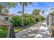 The property boasts a private dock with a pathway to a luxurious backyard oasis at 520 74Th St, Holmes Beach, FL 34217