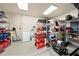 Well-organized garage with shelving, power tools, and ample storage solutions at 520 74Th St, Holmes Beach, FL 34217