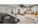 Modern kitchen with stainless steel appliances, island and white cabinets at 520 74Th St, Holmes Beach, FL 34217