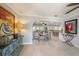 Spacious living area with tile flooring and seamlessly connects to dining space at 520 74Th St, Holmes Beach, FL 34217
