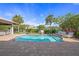 This backyard shows a sparkling pool and patio area, perfect for relaxing and enjoying the outdoor space at 520 74Th St, Holmes Beach, FL 34217