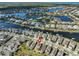 Stunning aerial of waterfront community with winding canals, lush landscaping, and beautiful homes at 5232 Wishing Arch Dr, Apollo Beach, FL 33572