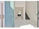 Bright foyer with marble flooring, staircase, and a view into the living room at 5232 Wishing Arch Dr, Apollo Beach, FL 33572