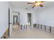 Bedroom featuring connecting hallway and walk-in closet at 5451 Oakhurst Dr, Seminole, FL 33772
