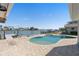 Waterfront home featuring a beautiful pool and picturesque ocean views at 5451 Oakhurst Dr, Seminole, FL 33772