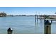 A serene waterfront view showcases boat docks and lifts along the waterway at 5451 Oakhurst Dr, Seminole, FL 33772
