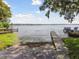 Scenic view of the lakefront property with docks and easy access for boating and recreation at 59 Lake Shore Dr, Palm Harbor, FL 34684