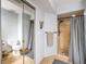 This bathroom features a shower and updated fixtures, plus a mirrored closet door for extra storage at 5900 Bahia Del Mar Cir # 137, St Petersburg, FL 33715