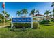 Community entrance sign for Isla Vista Verde West, featuring palm trees, lush landscaping and a gazebo at 5900 Bahia Del Mar Cir # 137, St Petersburg, FL 33715