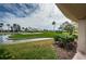 Relaxing view of a well-kept golf course with water features and a clear blue sky at 5900 Bahia Del Mar Cir # 137, St Petersburg, FL 33715