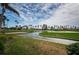 Expansive golf course view with palm trees, blue skies, and water features at 5900 Bahia Del Mar Cir # 137, St Petersburg, FL 33715