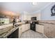 Well-appointed kitchen featuring elegant countertops, sleek appliances, and ample cabinet space at 5900 Bahia Del Mar Cir # 137, St Petersburg, FL 33715