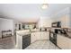 Bright kitchen offers ample cabinet space, granite countertops and black appliances at 5900 Bahia Del Mar Cir # 137, St Petersburg, FL 33715