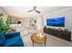 Comfortable living room with a TV, view of the dining area and modern lighting at 5900 Bahia Del Mar Cir # 137, St Petersburg, FL 33715
