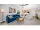 Open-concept living area with a comfortable sofa and a view of the kitchen at 5900 Bahia Del Mar Cir # 137, St Petersburg, FL 33715