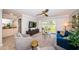 Inviting living room with outdoor views, opening up onto the kitchen area at 5900 Bahia Del Mar Cir # 137, St Petersburg, FL 33715