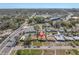 Aerial view of the property with its surroundings including street, neighboring houses, and the proximity to city amenities at 6618 3Rd N Ave, St Petersburg, FL 33710