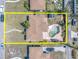 Aerial view of a single Gathering house showing the perimeter boundary, backyard pool and shed at 6618 3Rd N Ave, St Petersburg, FL 33710