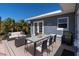 Back porch with an outdoor table and chairs and a seating area at 6618 3Rd N Ave, St Petersburg, FL 33710