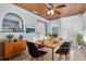 Dining room with wood table and archway that looks into the kitchen at 6618 3Rd N Ave, St Petersburg, FL 33710