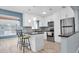 Bright kitchen features stainless steel appliances, breakfast bar, and stylish backsplash at 6618 3Rd N Ave, St Petersburg, FL 33710