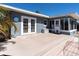 Outdoor patio offering space for dining and relaxing, complimented by nice landscaping at 6618 3Rd N Ave, St Petersburg, FL 33710