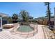 Backyard swimming pool enclosed by a safety fence, perfect for Gathering fun and relaxation at 6618 3Rd N Ave, St Petersburg, FL 33710